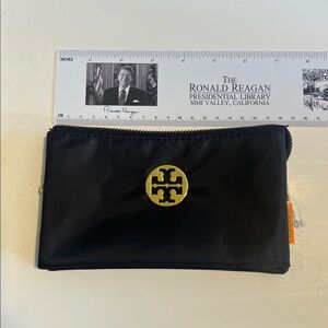 Tory Burch Black Pouch with Gold Emblem